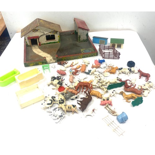133 - Vintage farm yard and a selection of animal figures to include Britains et