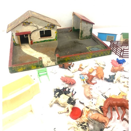 133 - Vintage farm yard and a selection of animal figures to include Britains et