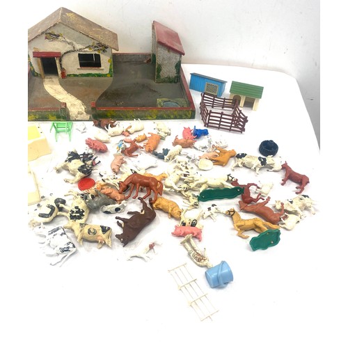 133 - Vintage farm yard and a selection of animal figures to include Britains et