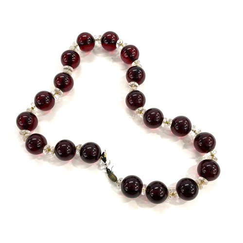 463 - Art deco cherry red amber type bead necklace total weight approx 112grams