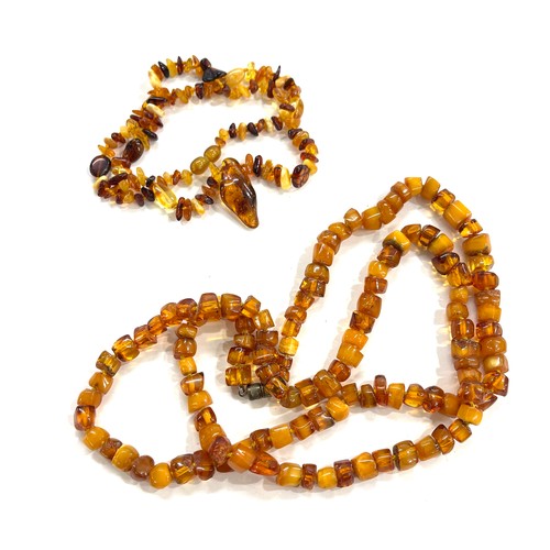 464 - Two strings of amber beads