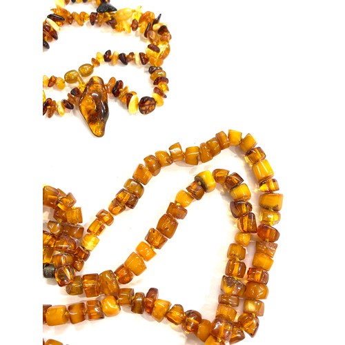 464 - Two strings of amber beads