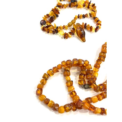 464 - Two strings of amber beads