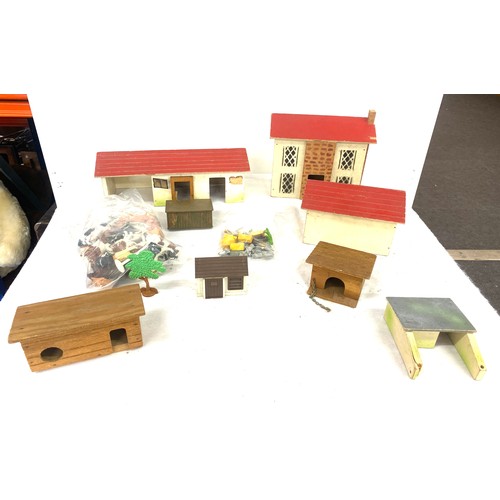 144 - Farmhouse and farmyard, 50 Britains animals, scarecrow and other bits