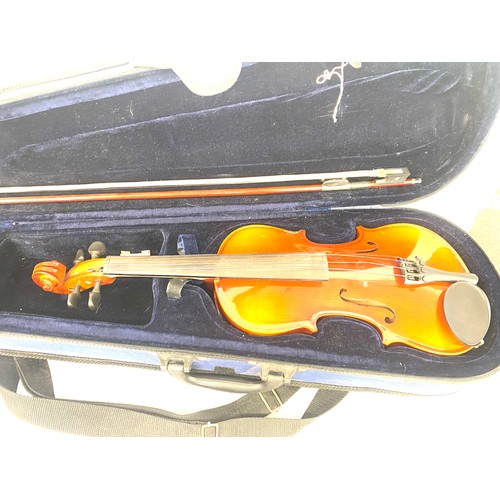 211 - A cased Inter music student violin in overall good condition