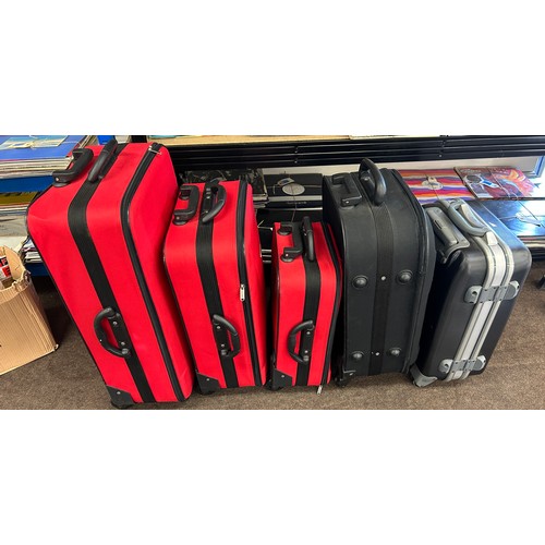 377 - Selection of assorted luggage cases includes constellation etc