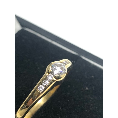 81 - Fine 18ct gold diamond ring central diamond measures approx 3.5mm dia with diamond shoulders weight ... 