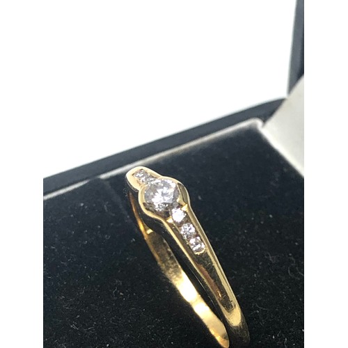 81 - Fine 18ct gold diamond ring central diamond measures approx 3.5mm dia with diamond shoulders weight ... 