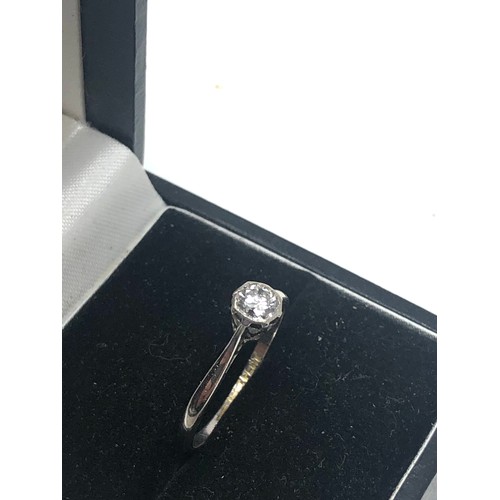 83 - 18ct white gold diamond ring set with central diamond measures approx 4mm dia weight 1.7g