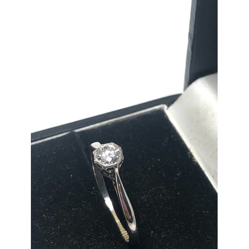 83 - 18ct white gold diamond ring set with central diamond measures approx 4mm dia weight 1.7g