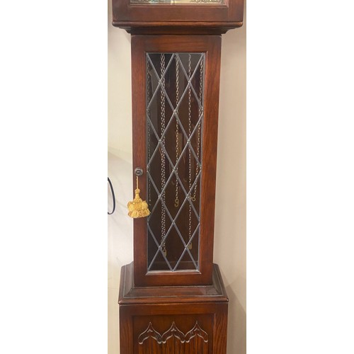 543 - Oak lining fold leaded glass long case clock, made in west Germany