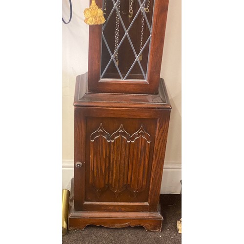 543 - Oak lining fold leaded glass long case clock, made in west Germany