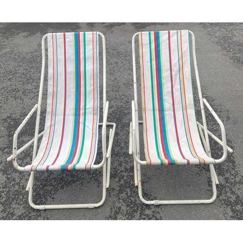 557 - Pair of vintage 70s rocking deck chairs