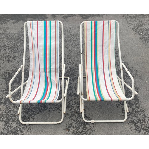 557 - Pair of vintage 70s rocking deck chairs