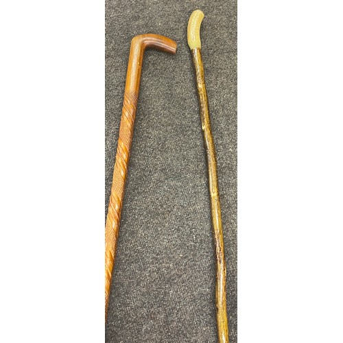 233 - 2 Vintage wooden walking sticks