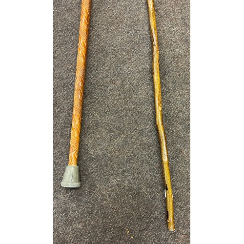 233 - 2 Vintage wooden walking sticks