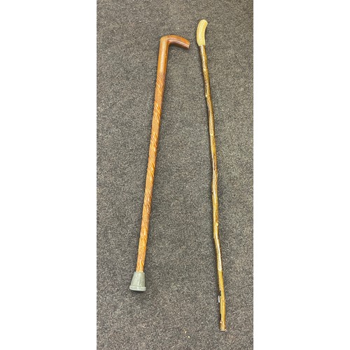 233 - 2 Vintage wooden walking sticks