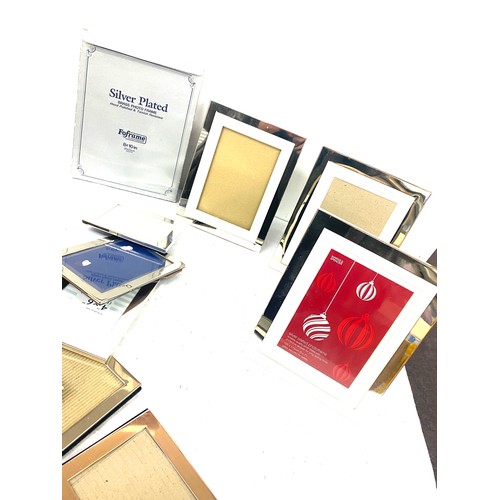 236 - Large selection of silver plated picture frames