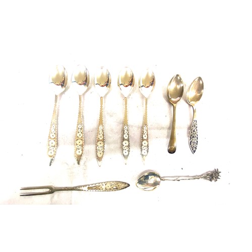 462 - Selection of silver cutlery includes continental silver spoons, pickle fork etc total weight 114g