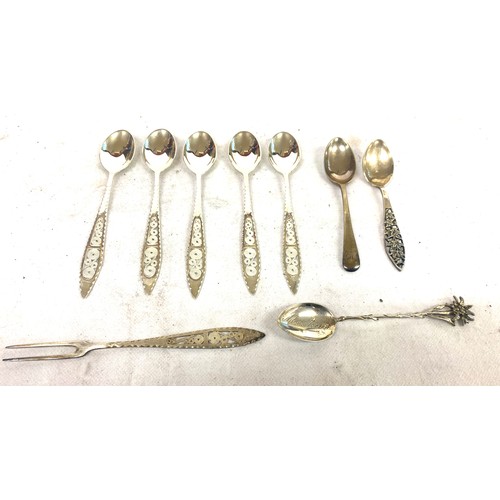 462 - Selection of silver cutlery includes continental silver spoons, pickle fork etc total weight 114g