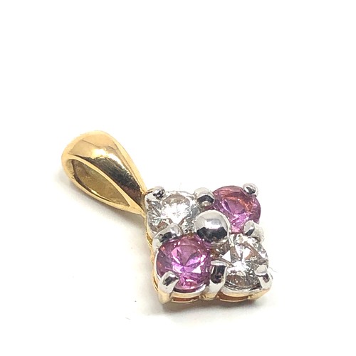 49 - 18ct gold diamond & pink sapphire pendant each diamond measures approx 4mm dia est .50 diamonds weig... 