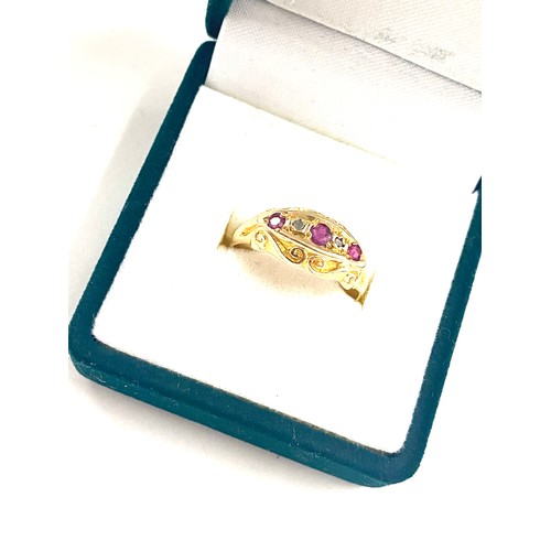 509 - Ladies 18ct gold hallmarked ruby and diamond ring, total weight approx 2.4grams