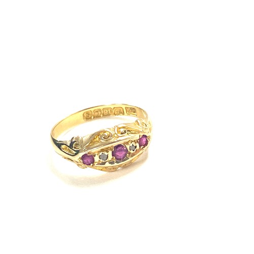 509 - Ladies 18ct gold hallmarked ruby and diamond ring, total weight approx 2.4grams