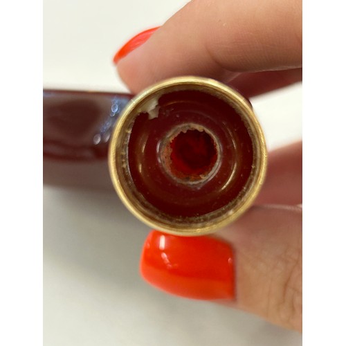 456 - Amber bakelite type walking stick handle total weight 60 grams, approximate internal diameter 1.6cm