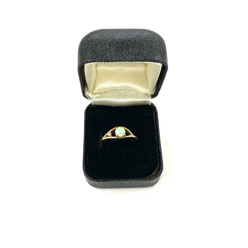 452 - Vintage 9ct gold opal and diamond ring marked 375, weight approx 1.7 grams  uk ring size N