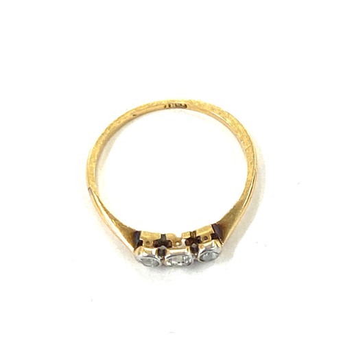 450 - Vintage 18ct gold 3 stone diamond ring marked 18ct weight 1.3grams uk ring size l+