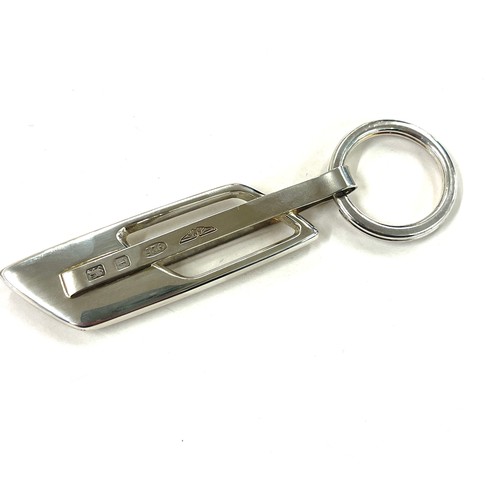 401 - Aston Martin Hallmarked Silver key fob unused