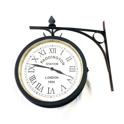 242 - Wall hanging Paddington station clock, diameter of clock is approximately 10 inches, untested