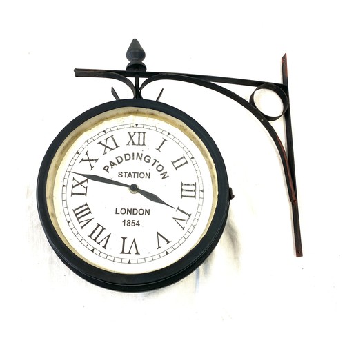 242 - Wall hanging Paddington station clock, diameter of clock is approximately 10 inches, untested