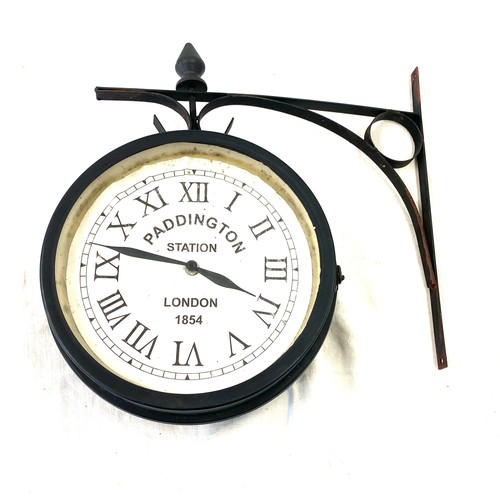 242 - Wall hanging Paddington station clock, diameter of clock is approximately 10 inches, untested