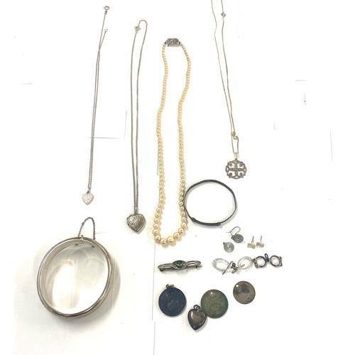 501 - Large selection vintage silver jewellery to include lockets, chains, pendants, cuff bangle, brooches... 