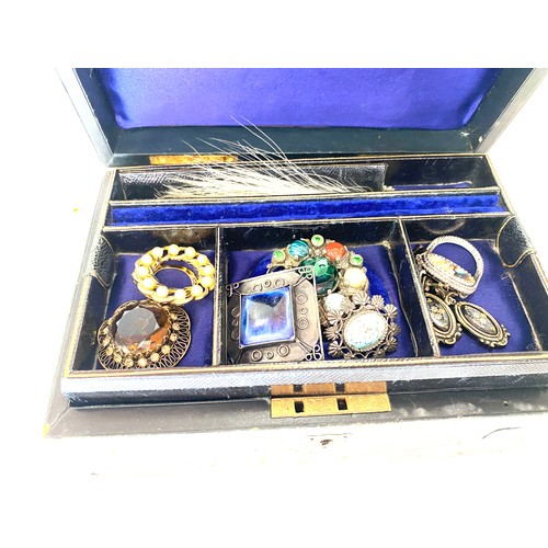 533 - Selection of vintage and later costume jewellery in a jewellery box includes brooches, earrings etc