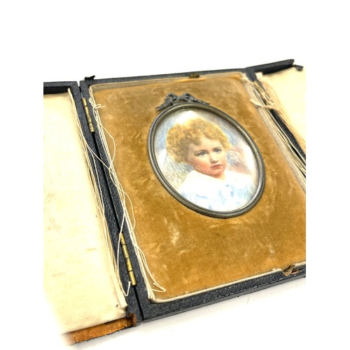 543 - Original hand painted portrait miniature of a young boy in leather case