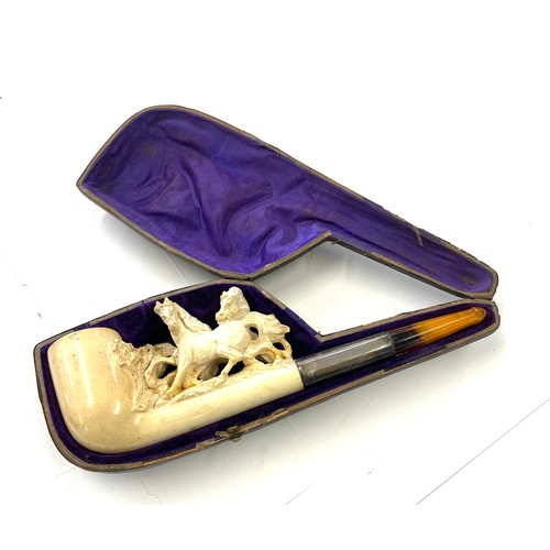 485 - Large 19th century Meerschaum pipe of horses with amber stem, in original box, however piece does ha... 