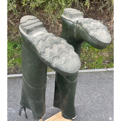 266 - Pair of hunter course fishing boots size 9 on a wooden stand