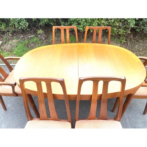 575 - Nathan teak extending dining table 6 chairs inc 2 carvers, approximate measurements of table: Height... 