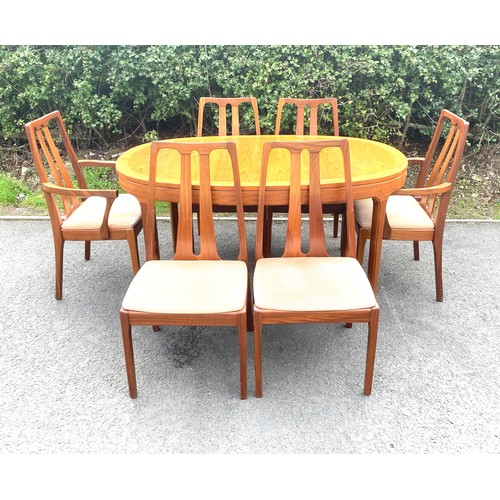 575 - Nathan teak extending dining table 6 chairs inc 2 carvers, approximate measurements of table: Height... 