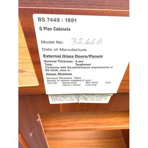 595 - G Plan Teak and glass record cabinet, approximate measurements: Height 29 inches, Width 19 inches, D... 