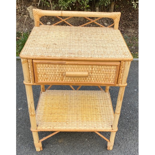 573 - 1 Drawer cane side table measures approx 25 inches tall 17 inches wide depth 11.5 inches