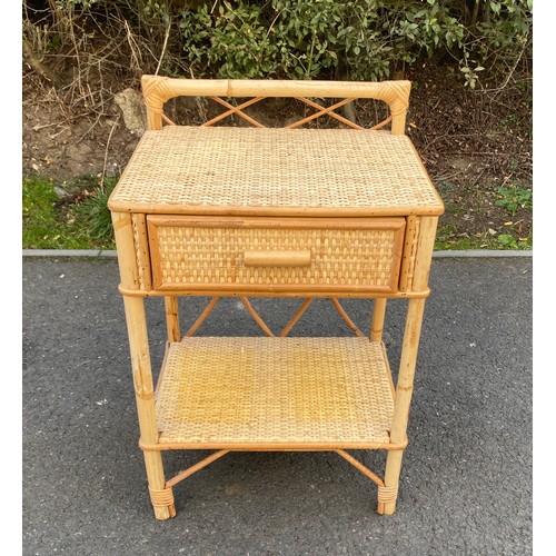 573 - 1 Drawer cane side table measures approx 25 inches tall 17 inches wide depth 11.5 inches