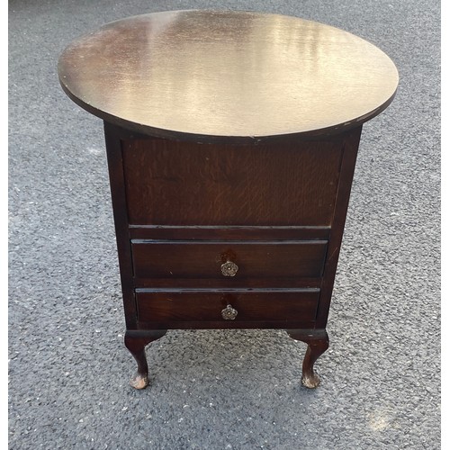 591 - Queen Oak sewing table and contents measures approx 21 inches tall 20 inches diameter