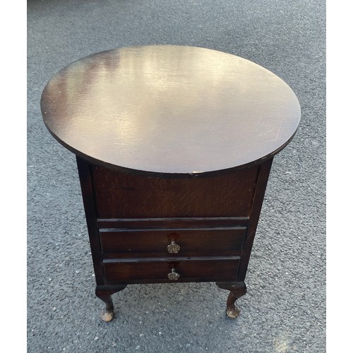 591 - Queen Oak sewing table and contents measures approx 21 inches tall 20 inches diameter