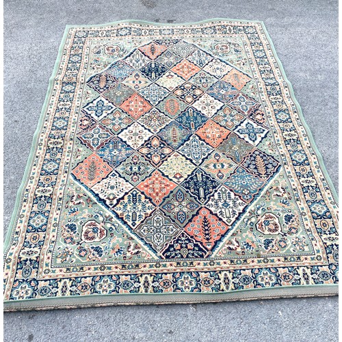 568 - Large lounge rug, approximate measurements 112 inches by 78 inches