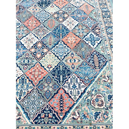 568 - Large lounge rug, approximate measurements 112 inches by 78 inches