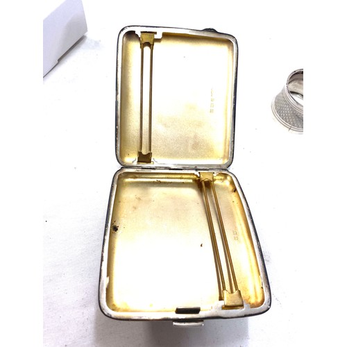 492 - Vintage silver engine turned cigarette case and a silver napkin ring, both hallmarked, total weight ... 