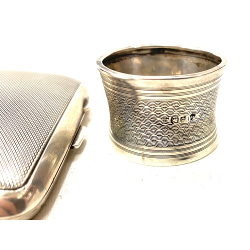 492 - Vintage silver engine turned cigarette case and a silver napkin ring, both hallmarked, total weight ... 